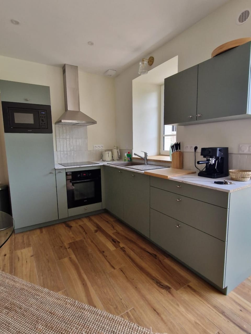 Kitchen or kitchenette, dishwasher, oven, stove, toaster