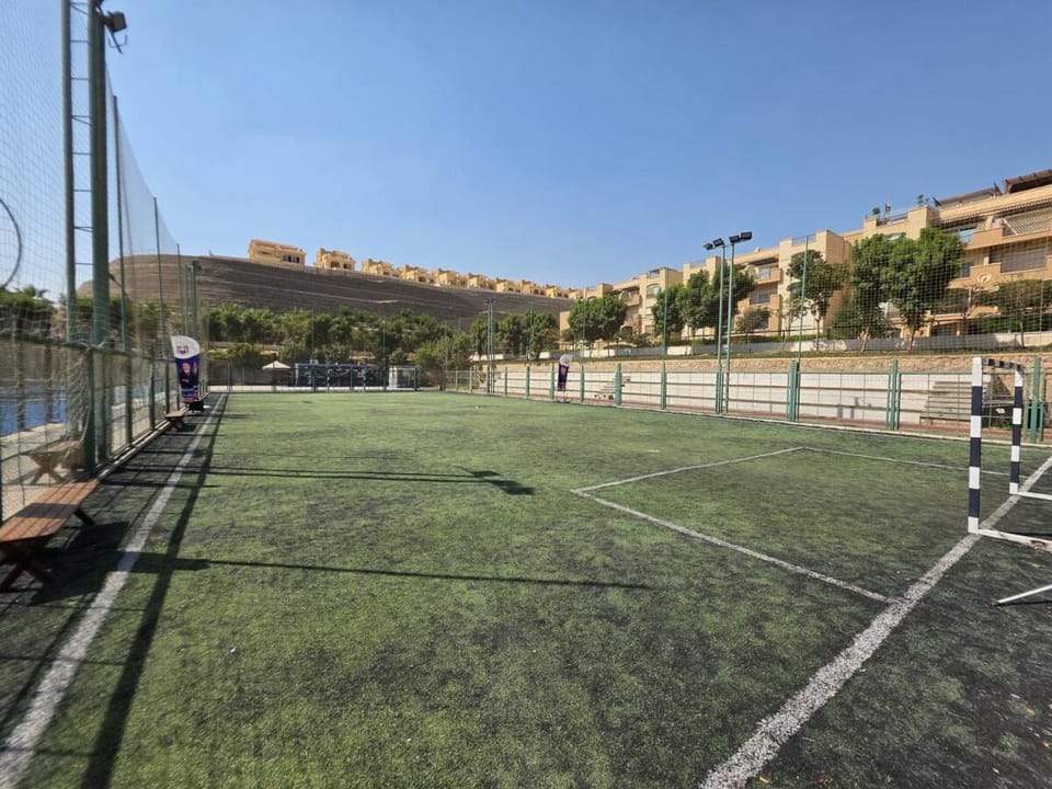 4 beds apt in Stone Residence compound Apartment in New Cairo City
