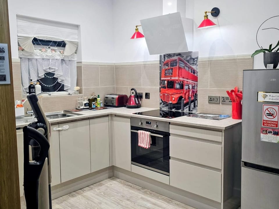 Coffee/tea facilities, dishwasher, microwave, oven, stove, toaster, toaster, kitchen