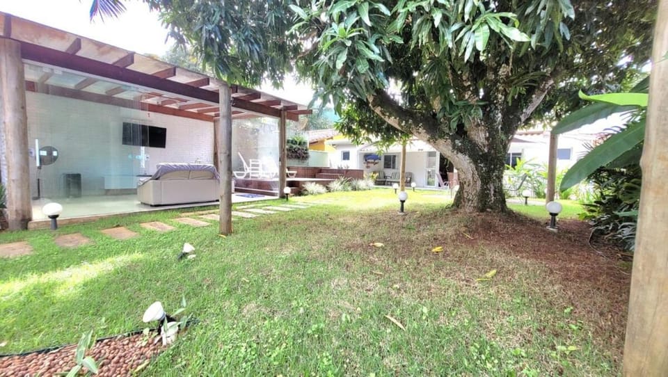 Casa de Condomínio com Piscina Aquecida, Ofurô Japonês, Churrasqueira, EV charger, BIG TV e 3 Suítes House in Caraguatatuba
