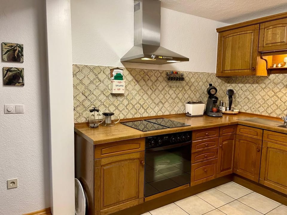 Kitchen or kitchenette, oven, stove