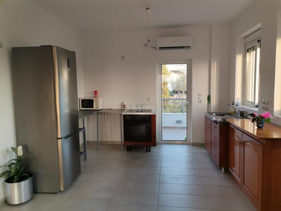 Kitchen or kitchenette, oven, stove, air conditioner