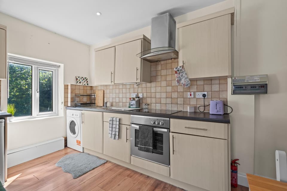 Kitchen or kitchenette, oven, toaster