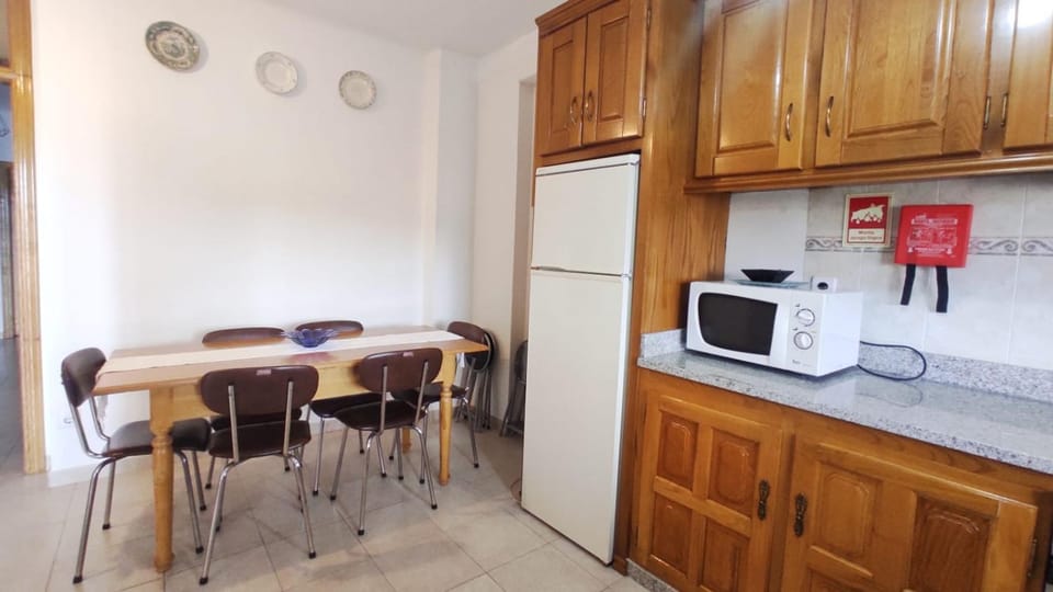 Kitchen or kitchenette, oven, stove