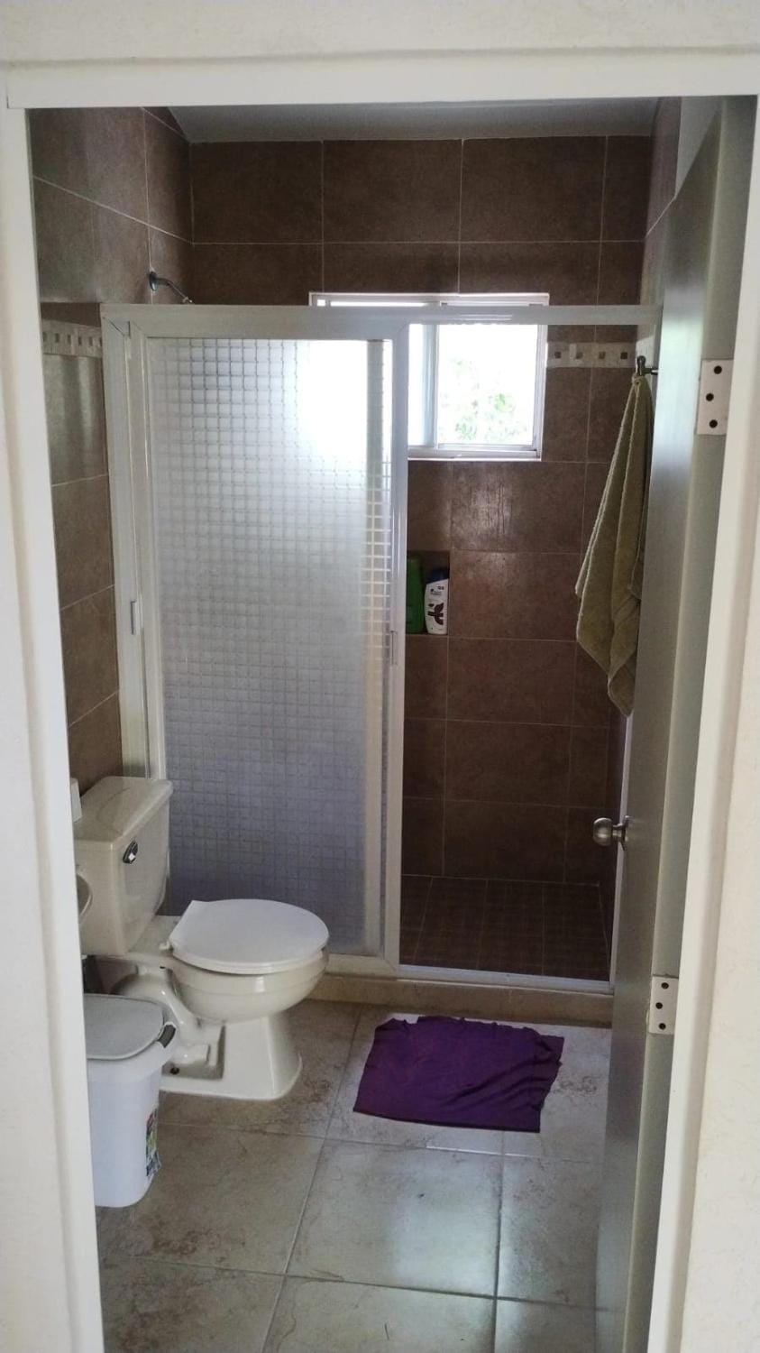 Shower, Toilet, Bathroom, hair dryier, towels