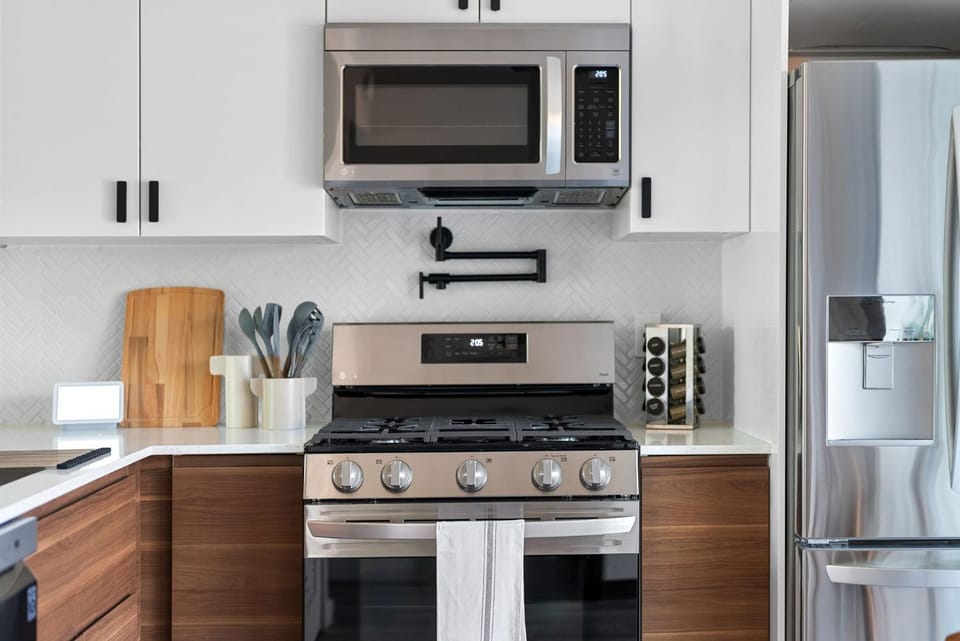 Kitchen or kitchenette, dishwasher, microwave, oven, stove, toaster, kitchen