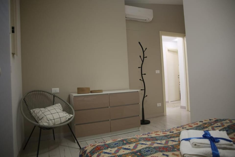 Bed, Photo of the whole room, Bedroom, towels, air conditioner