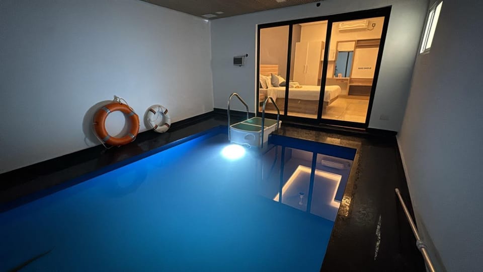 Bed, Bedroom, Pool view, Swimming pool, wardrobe