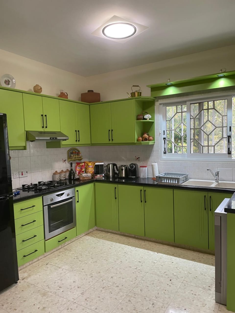 Kitchen or kitchenette, dishwasher, oven, stove, toaster