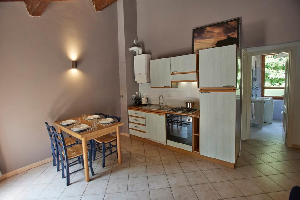 Kitchen or kitchenette, oven, stove
