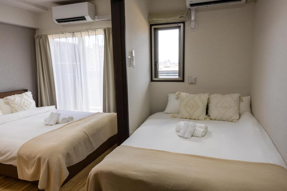 Bed, Photo of the whole room, Bedroom, towels, air conditioner