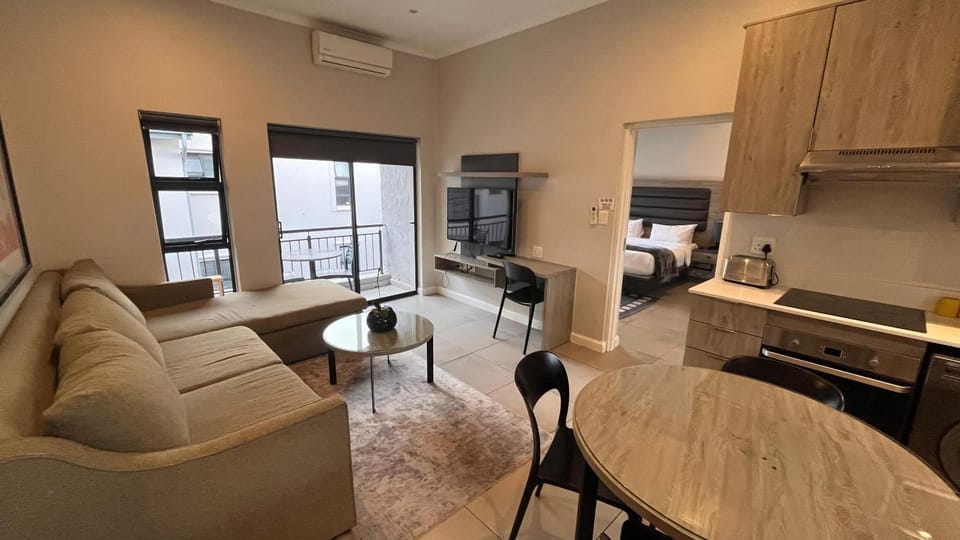 Kitchen or kitchenette, Living room, Seating area, Dining area, stove, air conditioner