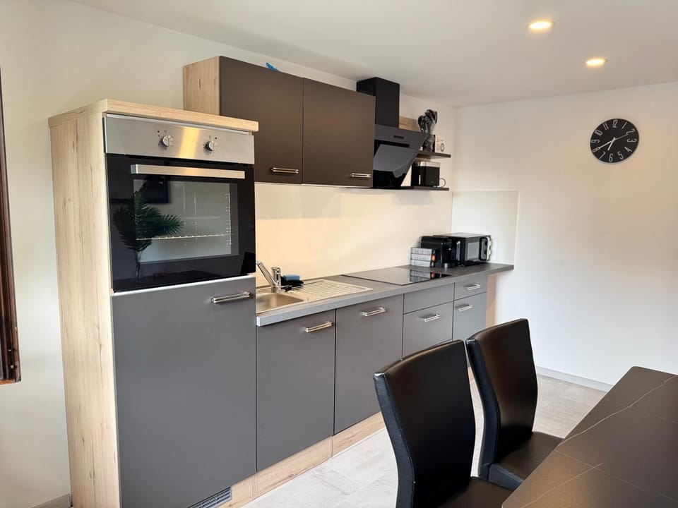 Kitchen or kitchenette, oven, stove, toaster