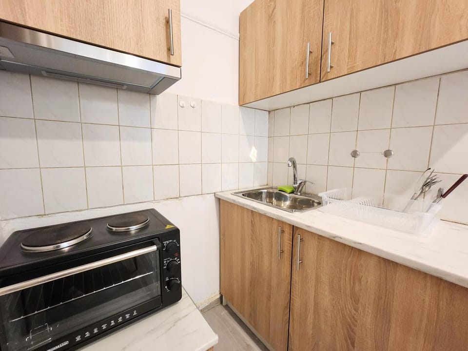 Kitchen or kitchenette, stove
