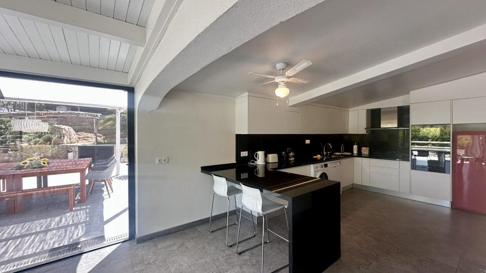 Kitchen or kitchenette, dishwasher, oven, stove