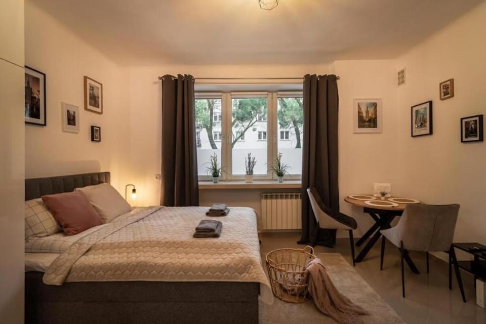 Bed, Living room, Seating area, Bedroom