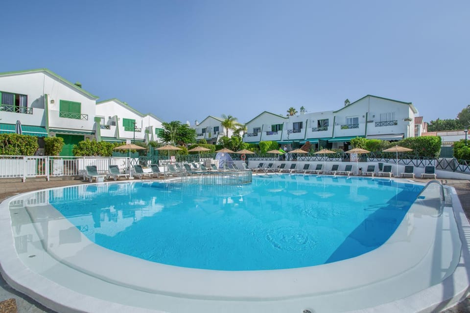 Property building, Living room, Swimming pool