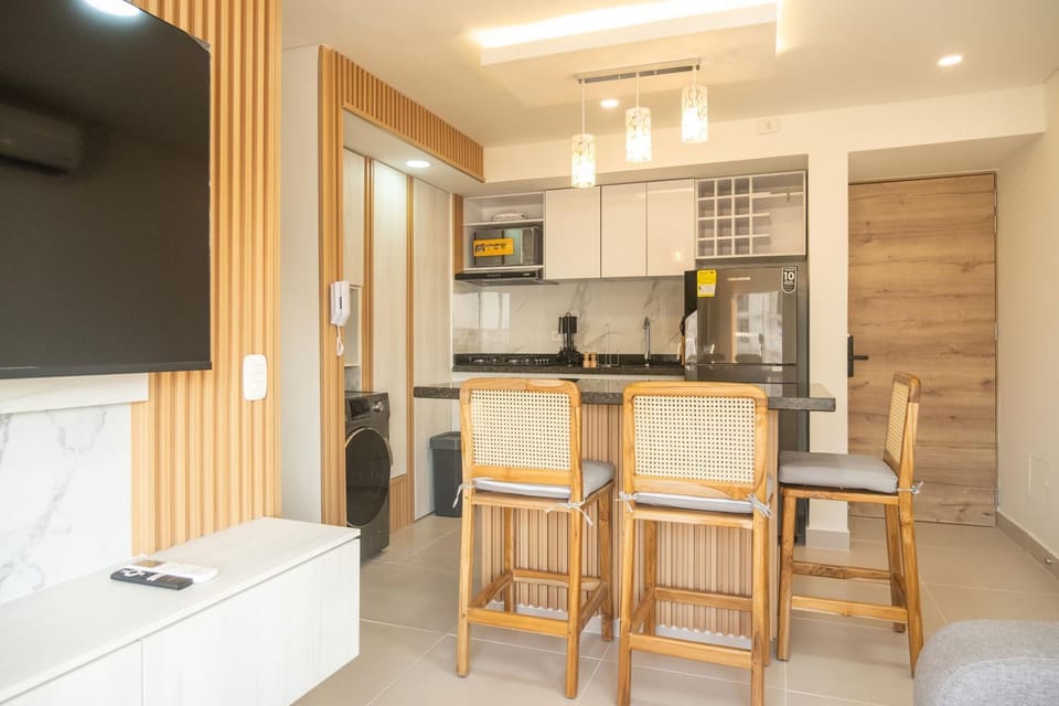 TV and multimedia, Kitchen or kitchenette, Living room, Seating area, air conditioner