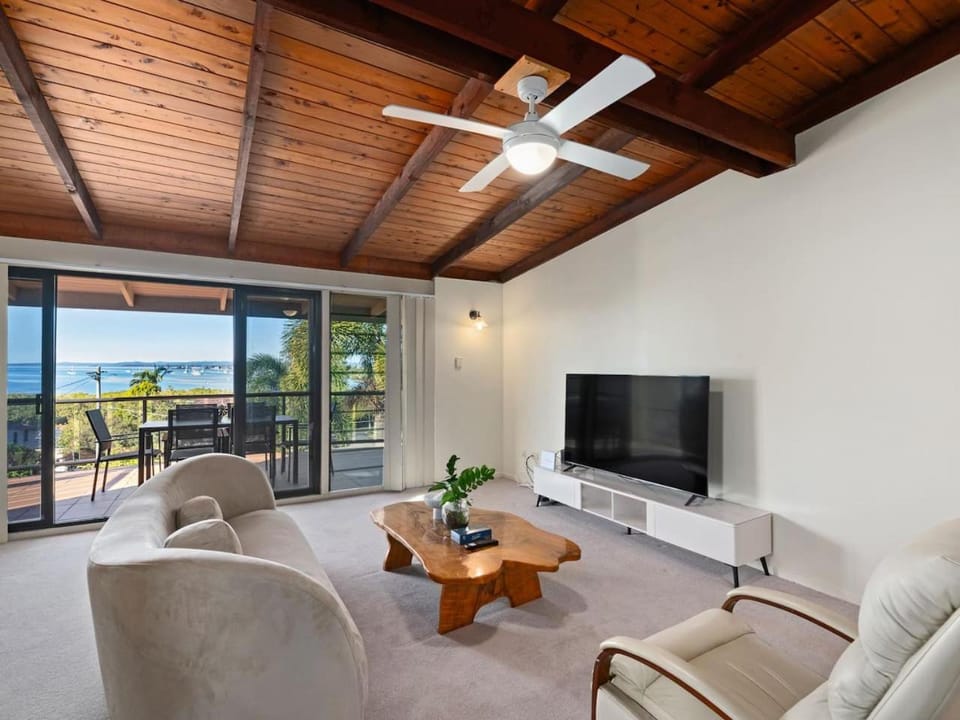Coastal Family Escape with Pool Balcony and Bay Views House in Cleveland