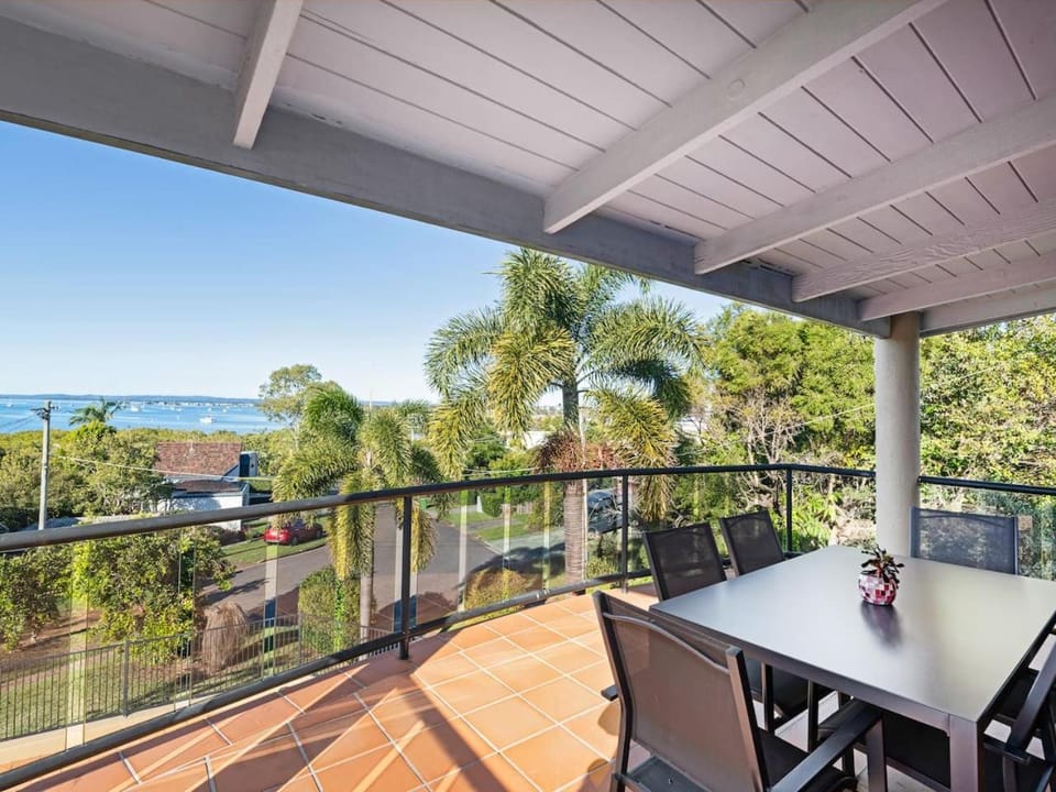 Coastal Family Escape with Pool Balcony and Bay Views House in Cleveland