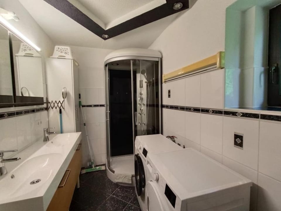 Bathroom, washing machine, dryer