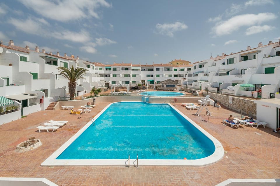 Property building, Living room, Swimming pool