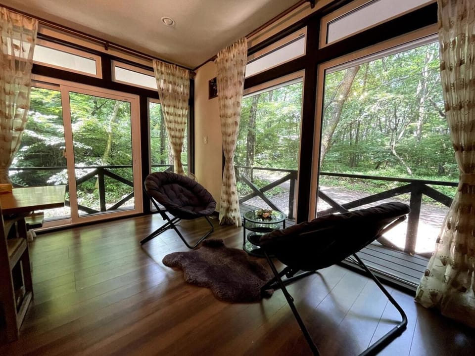 Day, View (from property/room), Living room, Seating area, Garden view