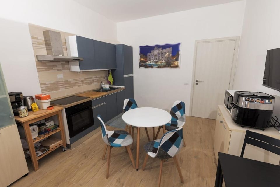 Coffee/tea facilities, Kitchen or kitchenette, Living room, Seating area, Dining area, minibar, oven, stove, toaster