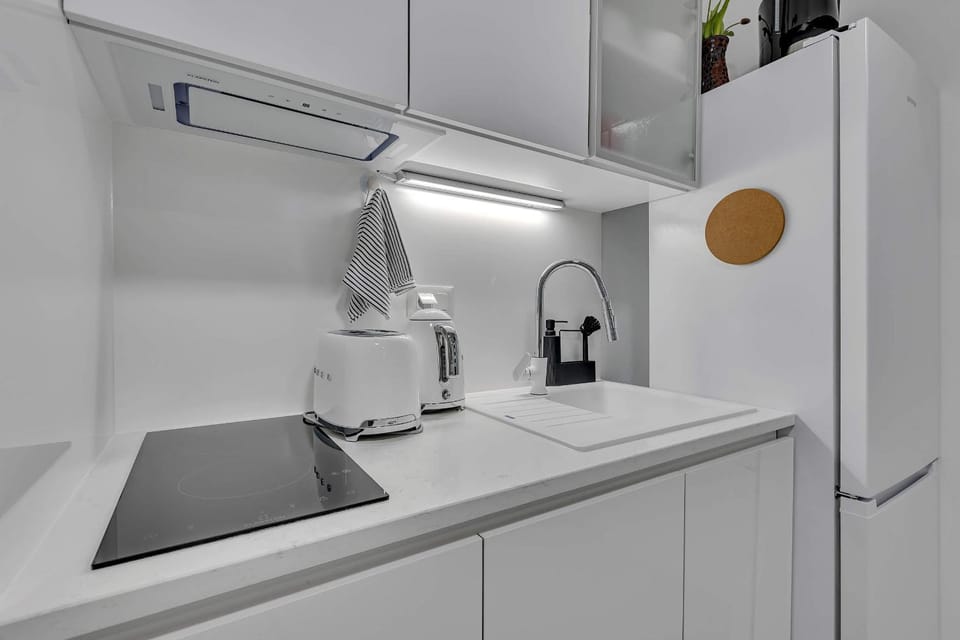 Kitchen or kitchenette, stove, toaster