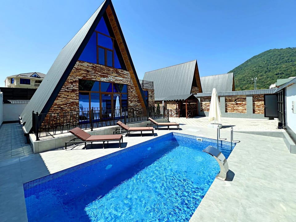 Day, Natural landscape, Mountain view, Swimming pool, sunbed