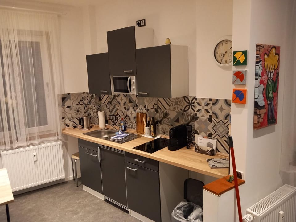 Kitchen or kitchenette, stove, kitchen