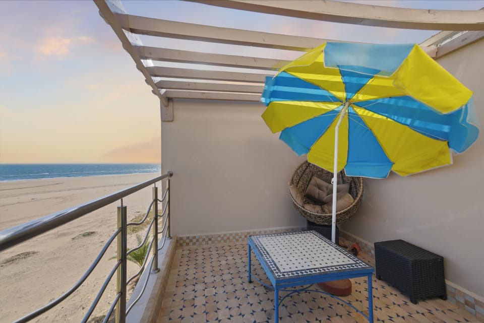 View (from property/room), Balcony/Terrace, Seating area, Beach, Sea view