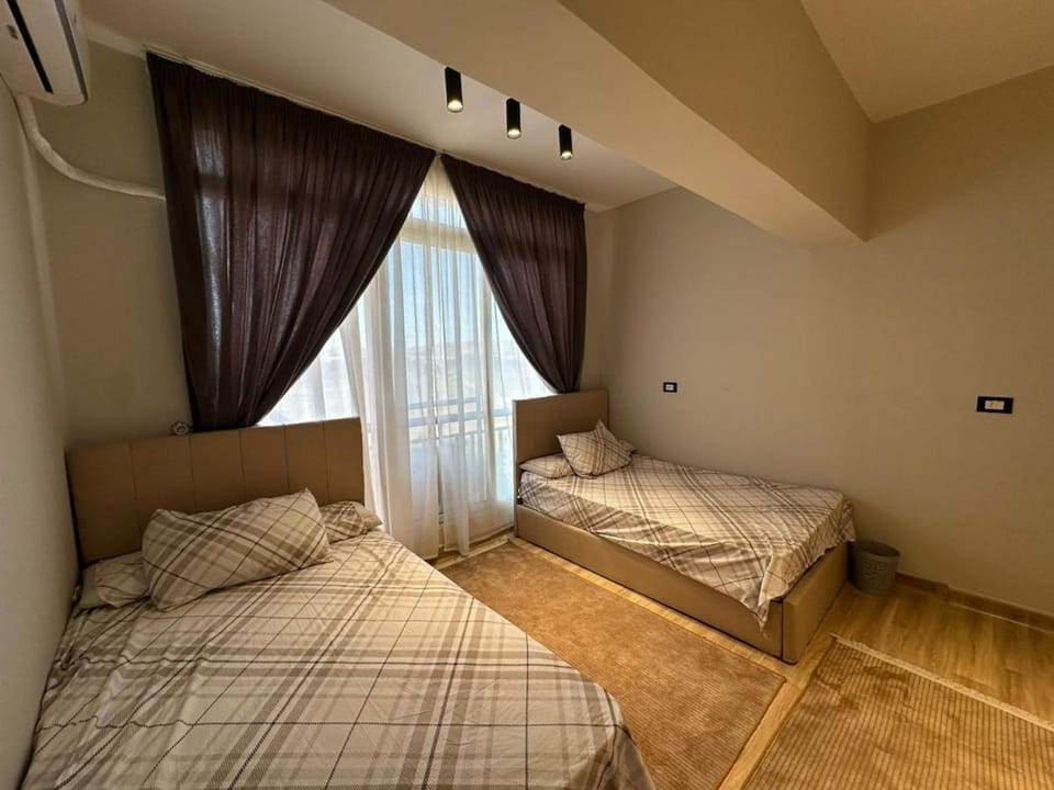 A hotel apartment for rent in front of the Egypt Mall Apartment in Egypt