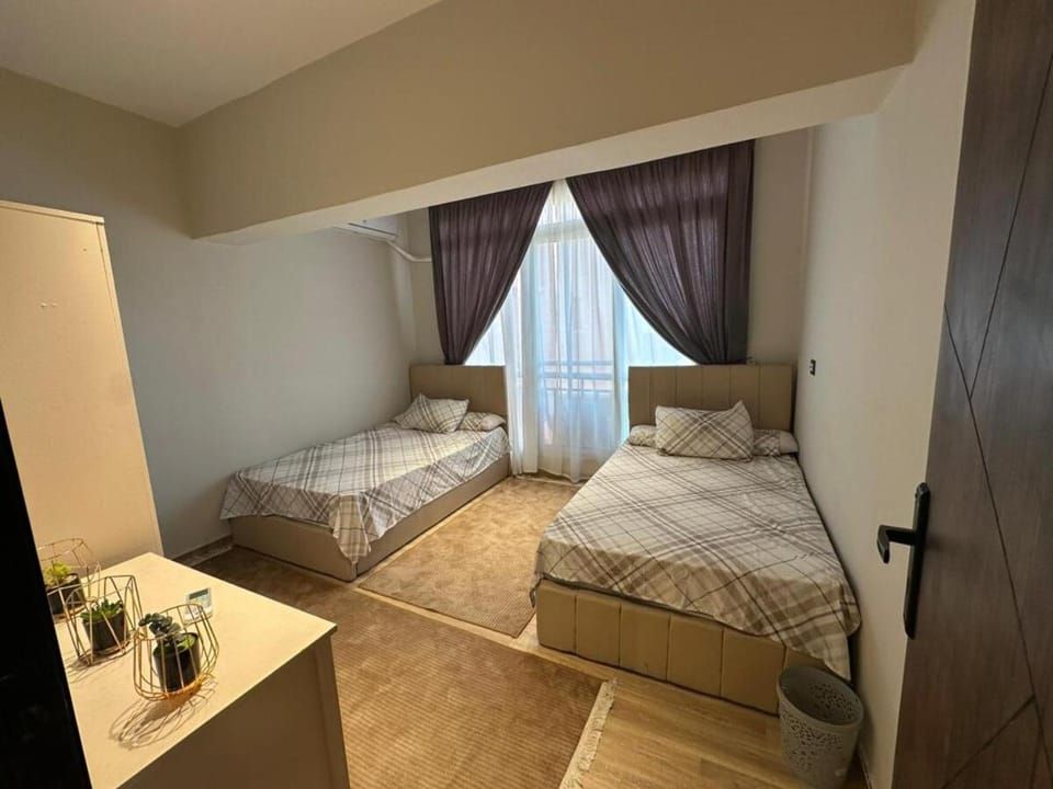 A hotel apartment for rent in front of the Egypt Mall Apartment in Egypt