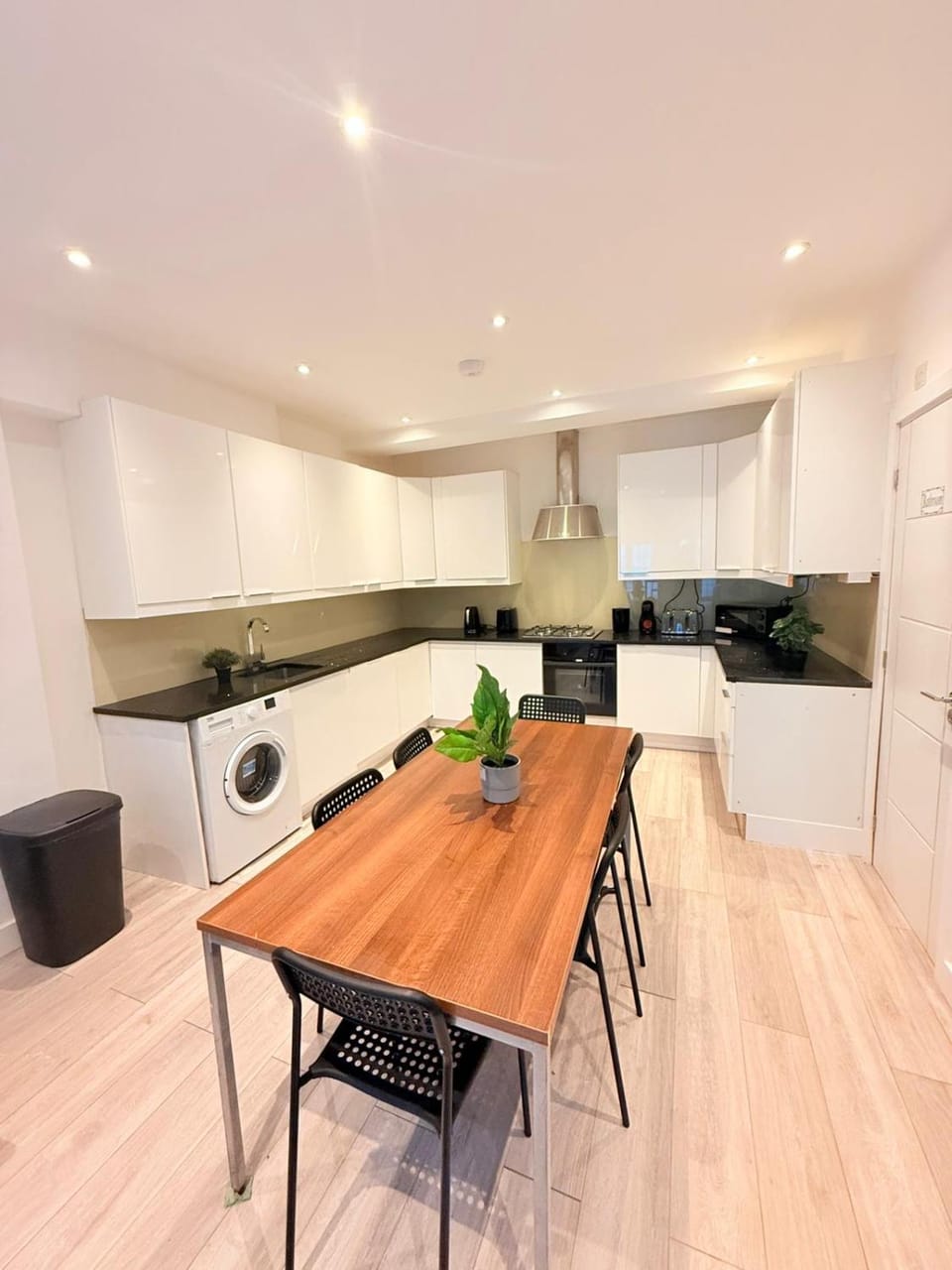 Kitchen or kitchenette, Dining area, oven, stove, toaster, washing machine