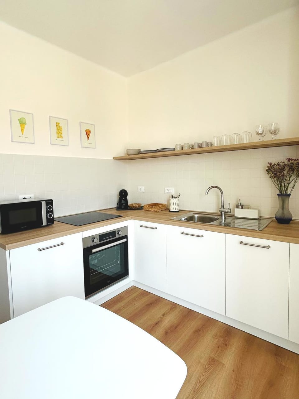 Kitchen or kitchenette, dishwasher, oven, stove