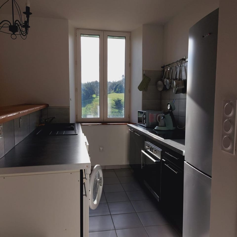 Kitchen or kitchenette, dishwasher, oven, stove