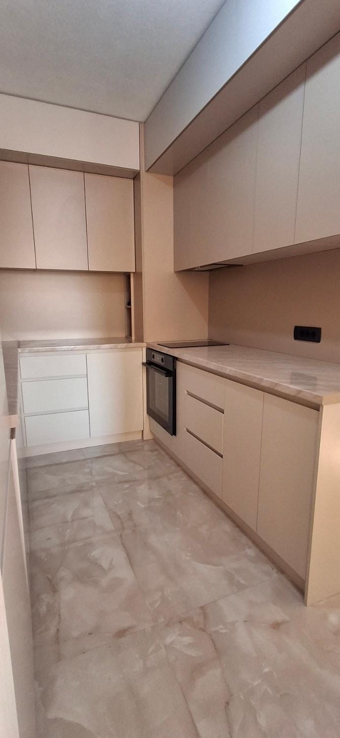 Kitchen or kitchenette, oven