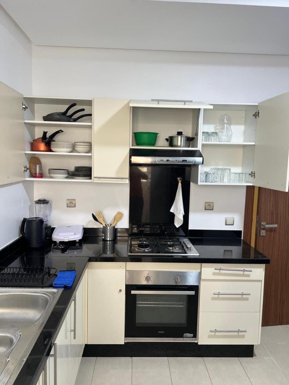 Kitchen or kitchenette, dishwasher, oven, stove, toaster