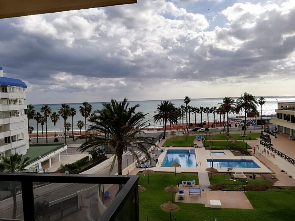 View (from property/room), Balcony/Terrace, Pool view, Sea view, Swimming pool