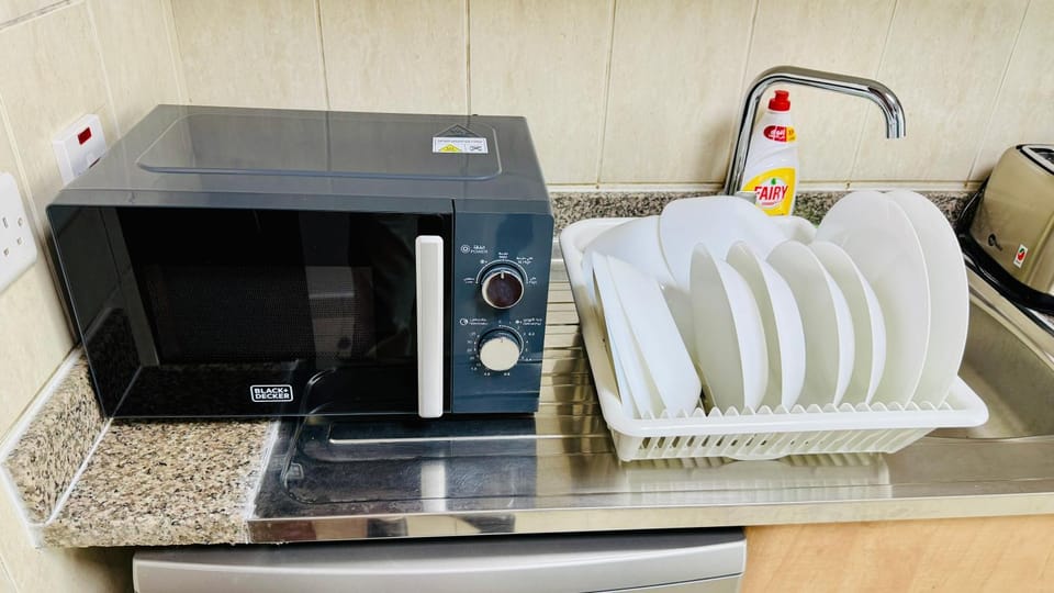 Kitchen or kitchenette, microwave