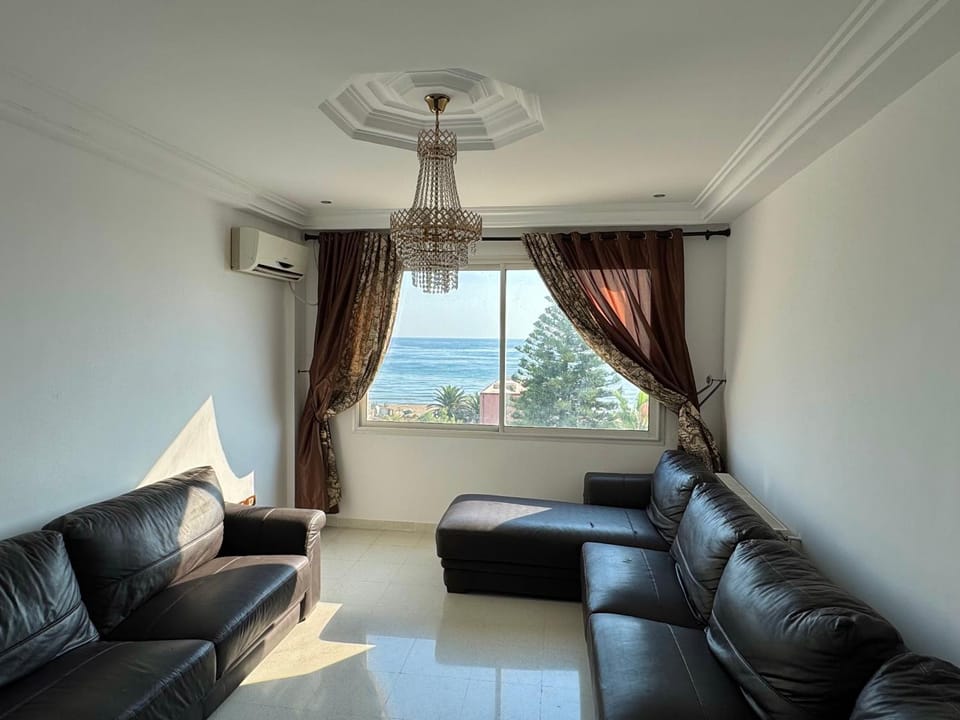 Natural landscape, Living room, Seating area, Sea view