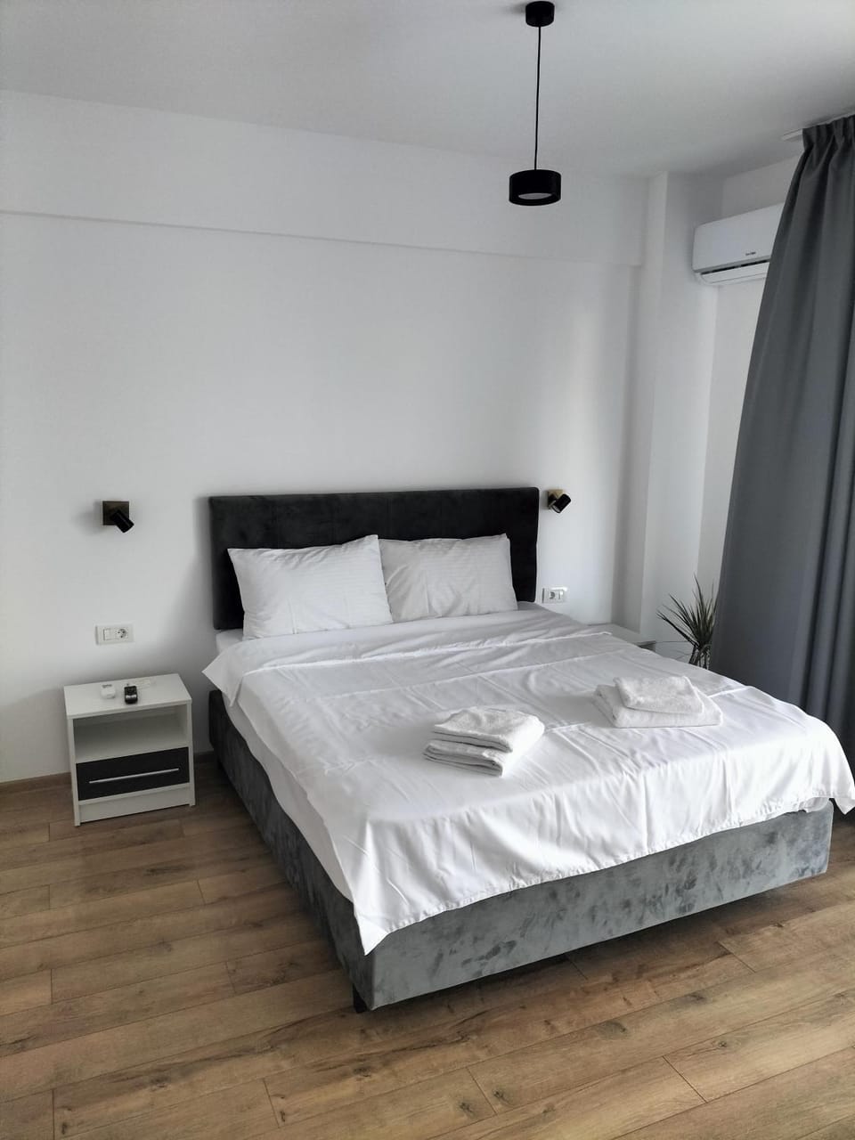 Bed, Photo of the whole room, Bedroom, towels, air conditioner