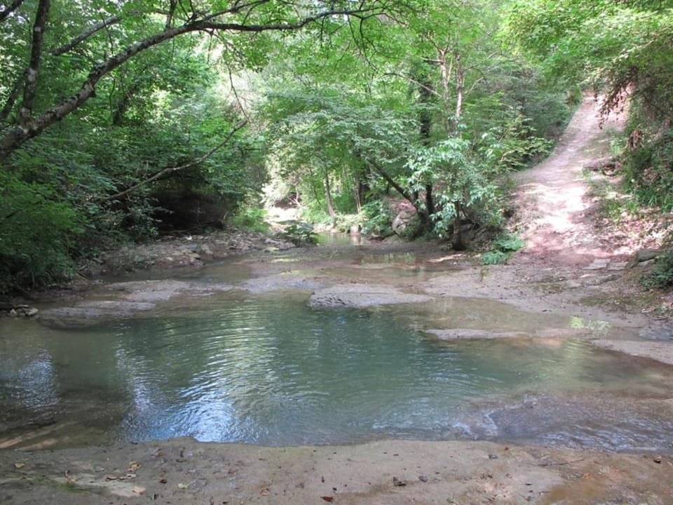 restored water mill with rockpools and waterfall House in Umbria