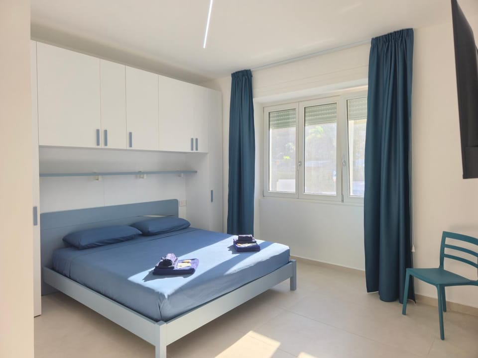 Bed, Photo of the whole room, Bedroom, towels, wardrobe