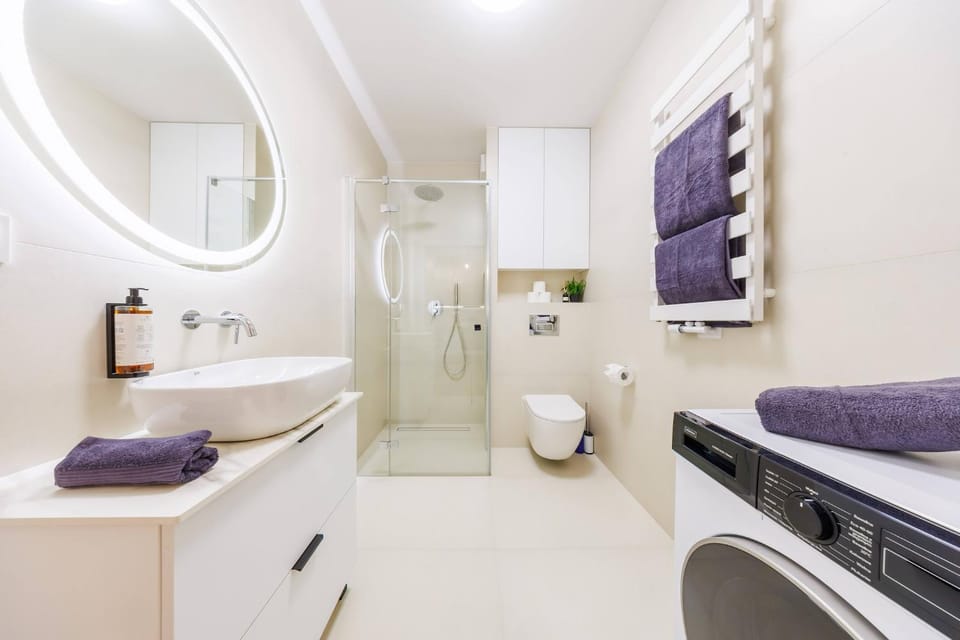 Shower, Toilet, Bathroom, towels, washing machine, dryer
