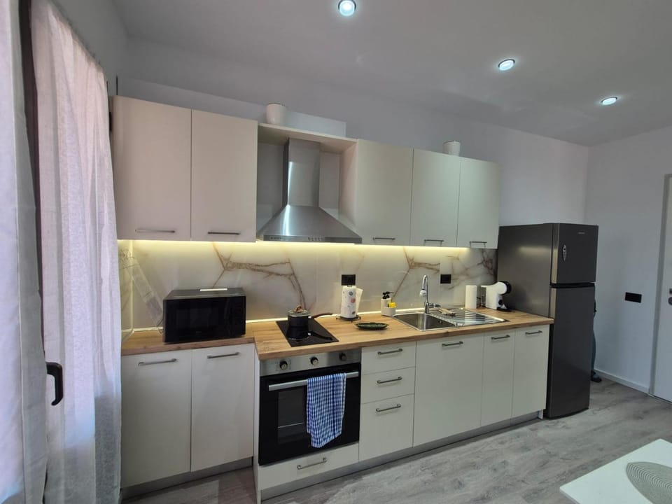 Kitchen or kitchenette, oven, stove