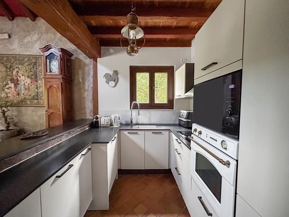 Kitchen or kitchenette, stove