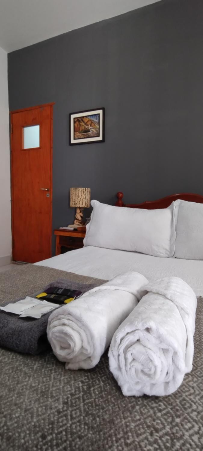 Bed, Seating area, Bedroom, towels