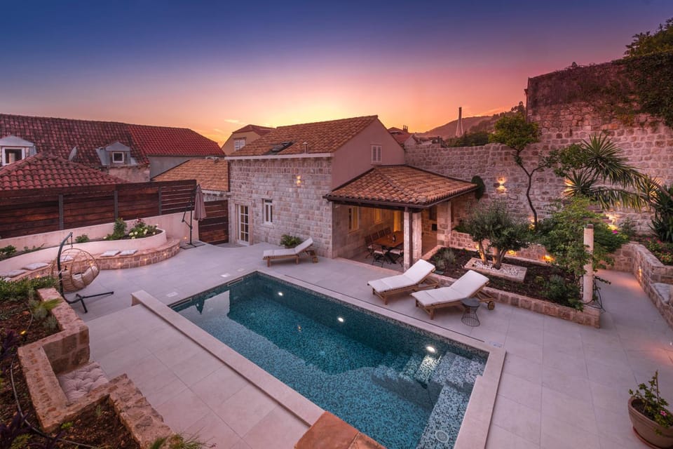 Property building, Patio, Pool view, Swimming pool, Sunset, sunbed